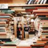 books on brown wooden shelf