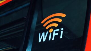 a close up of the wifi logo on the side of a bus