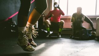 person wearing brown-and-white shoes jumping